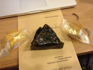 Step 3: Remove the left side of the wrapper to expose the whole kimbab. 